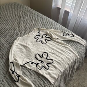 White Sweater with Black Floral Design